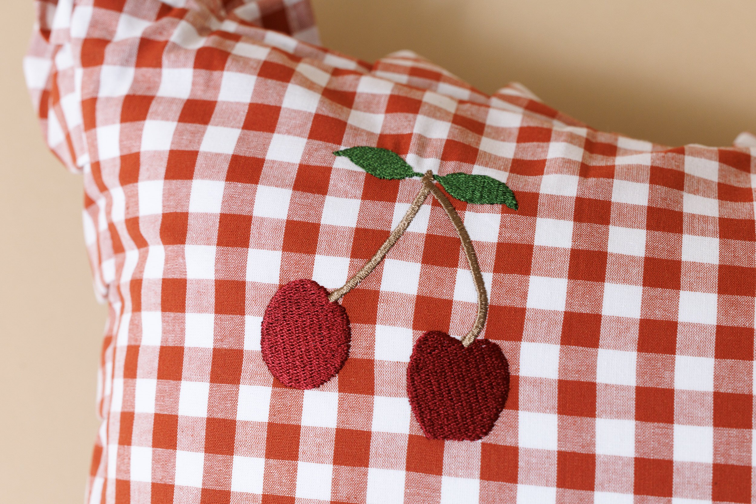 Checkered Cherry Cushion - Red