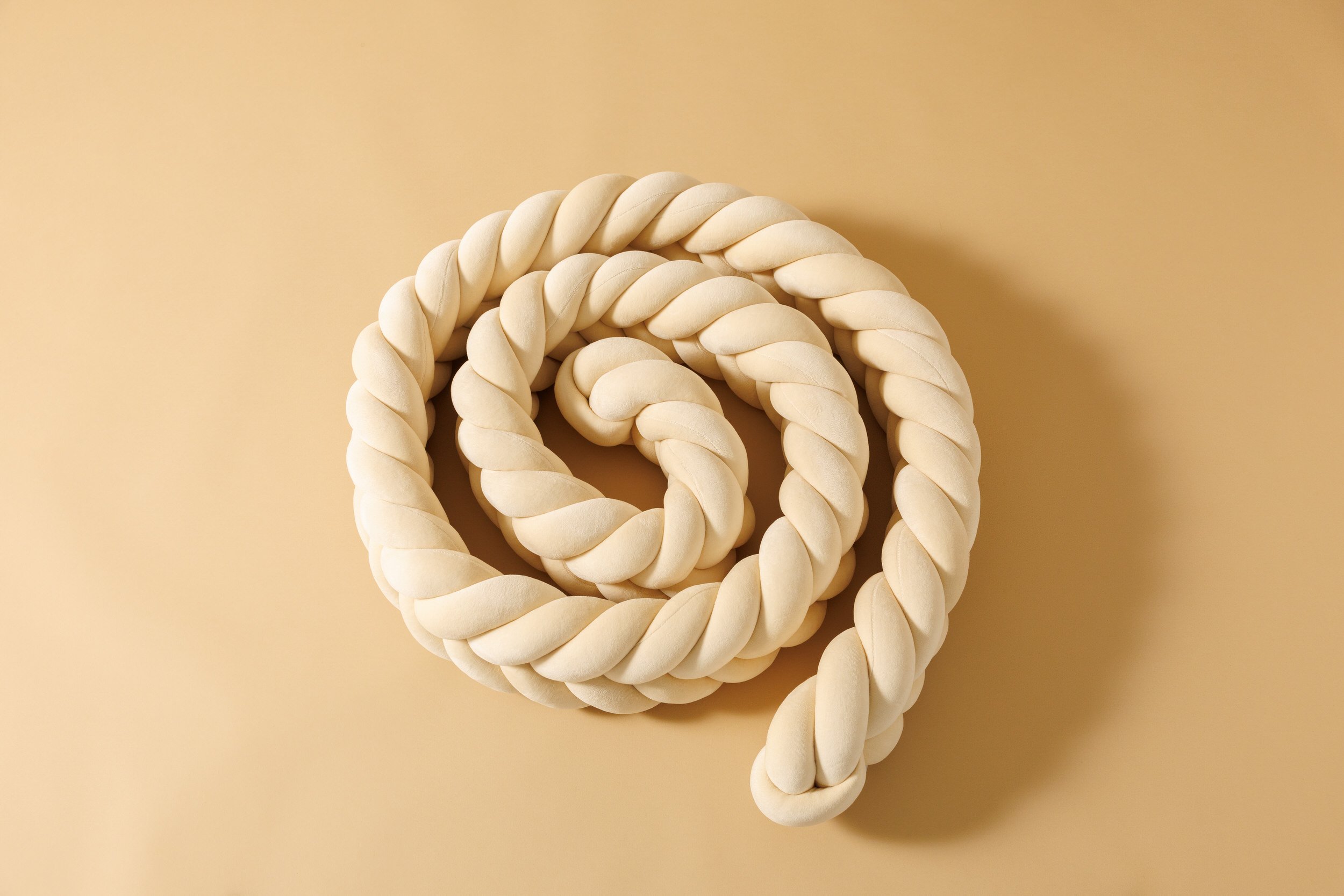 Almond Fishtail Braided Bed Bumper