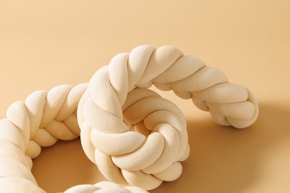 Almond Fishtail Braided Bed Bumper