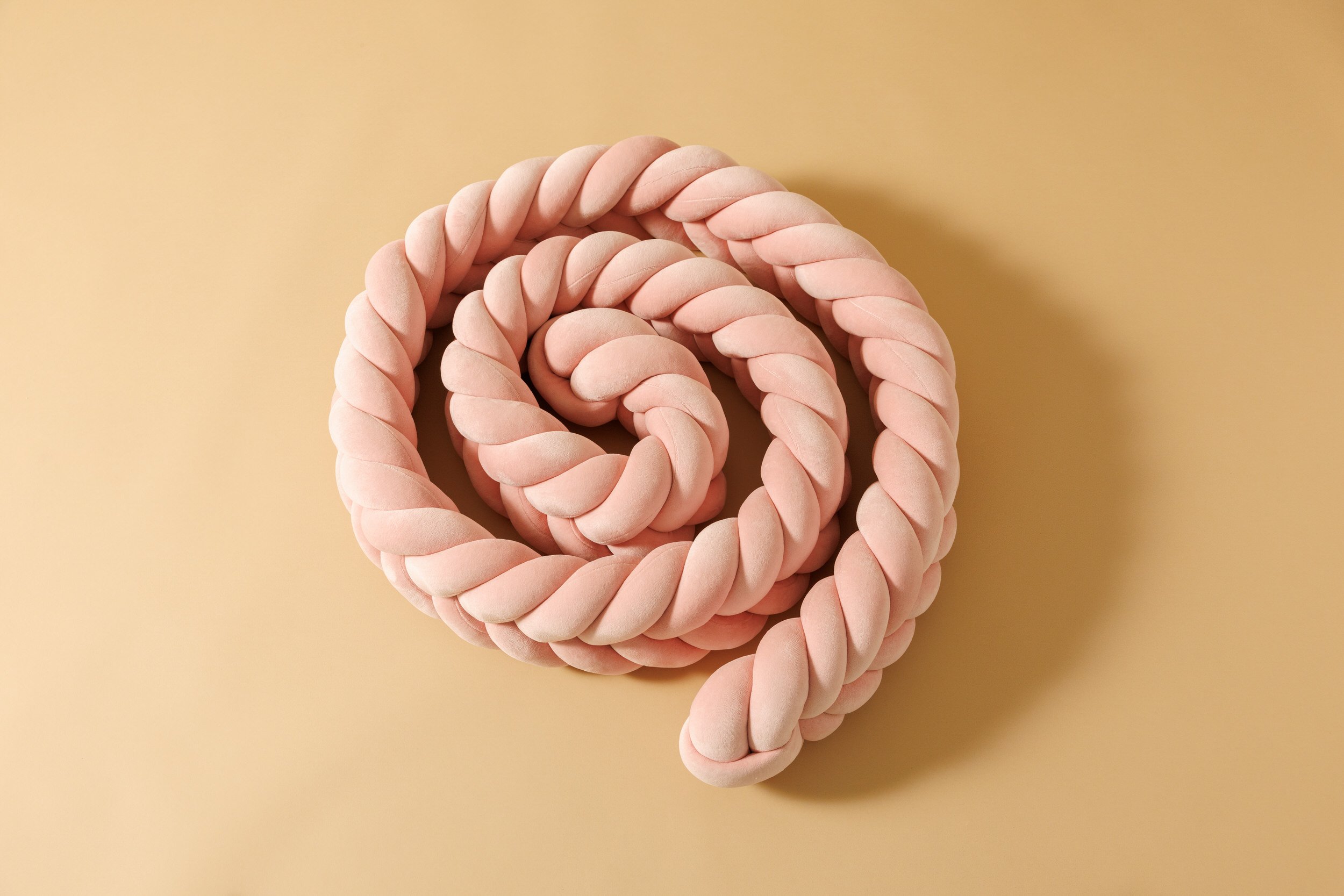 Powder Pink Fishtail Braided Bed Bumper