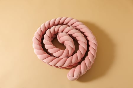 Powder Pink Fishtail Braided Bed Bumper