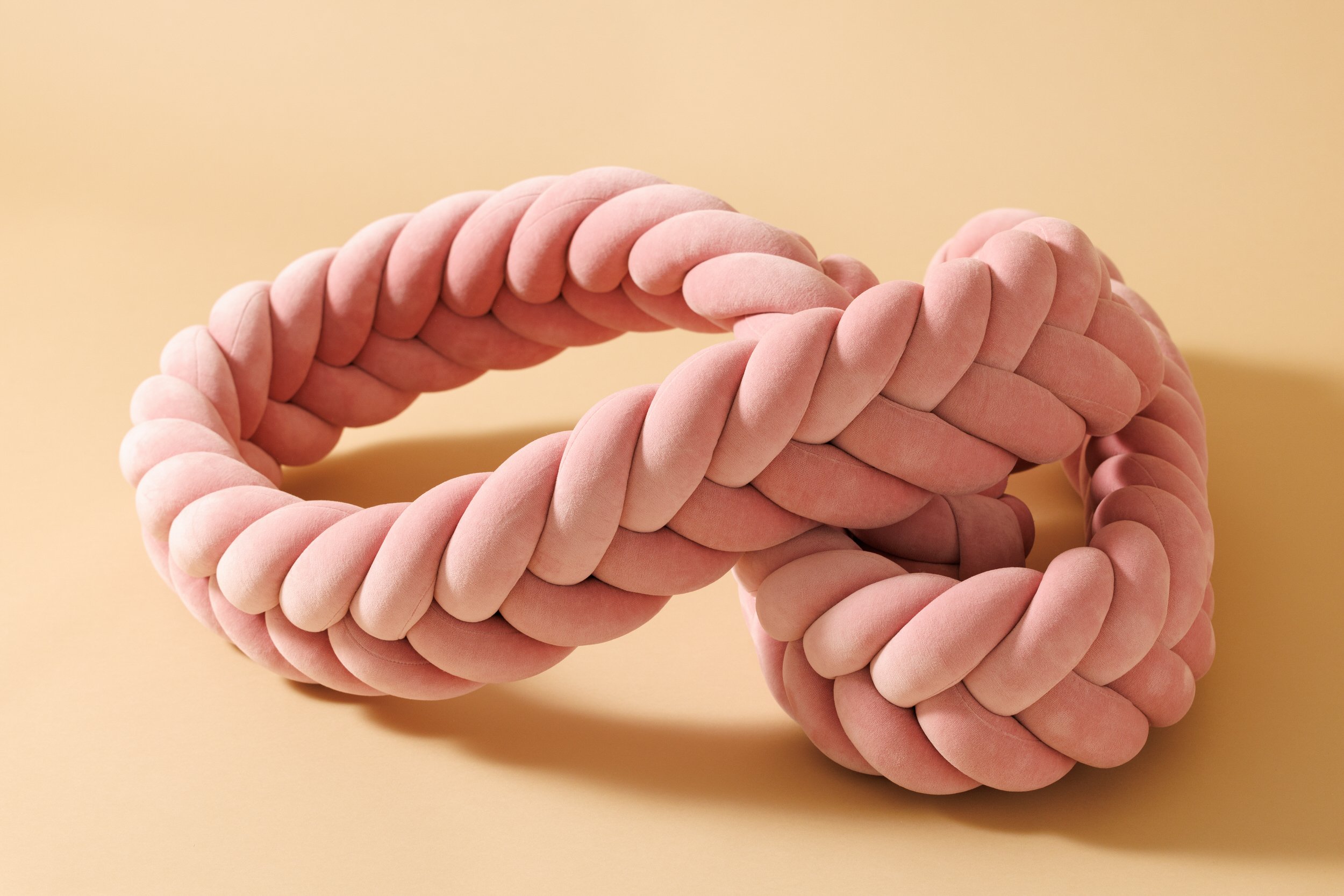 Powder Pink Fishtail Braided Bed Bumper