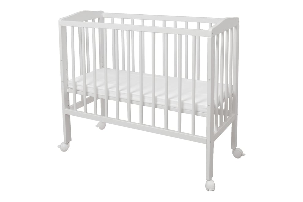 White Bedside Crib with Mattress and Bed Bumper