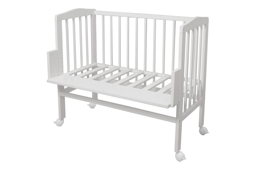 White Bedside Crib with Mattress and Bed Bumper