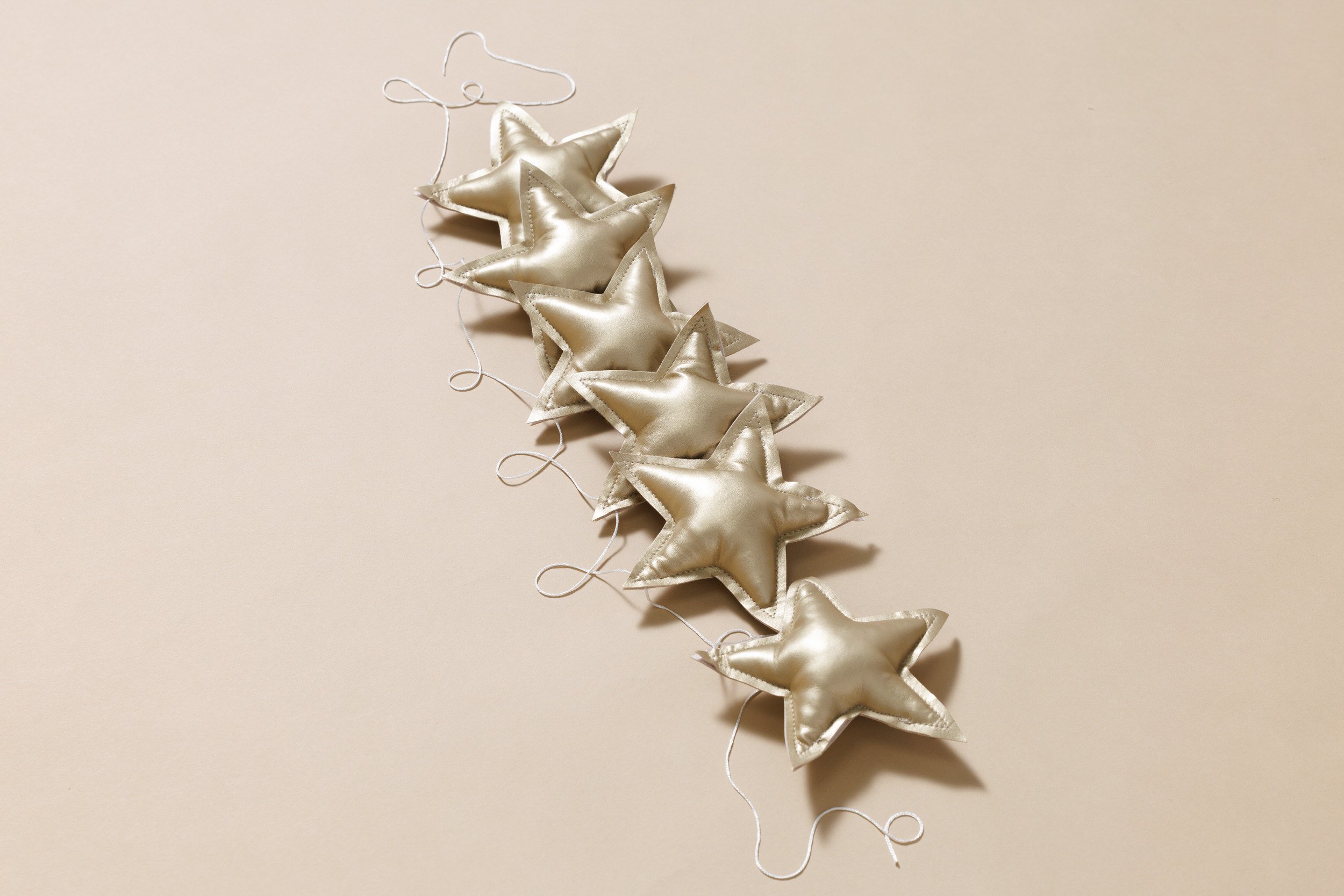 Guirlande Étoiles en cuir éco - Doré Guirlande Étoiles en cuir éco - Doré