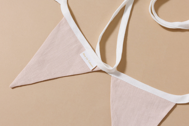 Ghirlanda di Triangoli in Velluto a Coste Crema e Rosa