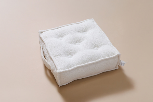 Bouclé puf vanilkový