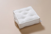 Bouclé puf vanilkový